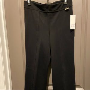 Black Calvin Klein pants.